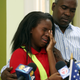 Ronyde Ponthieux, 10, cries as she talks about her family’s immigration status at a news conference in Miami. Photo: AP